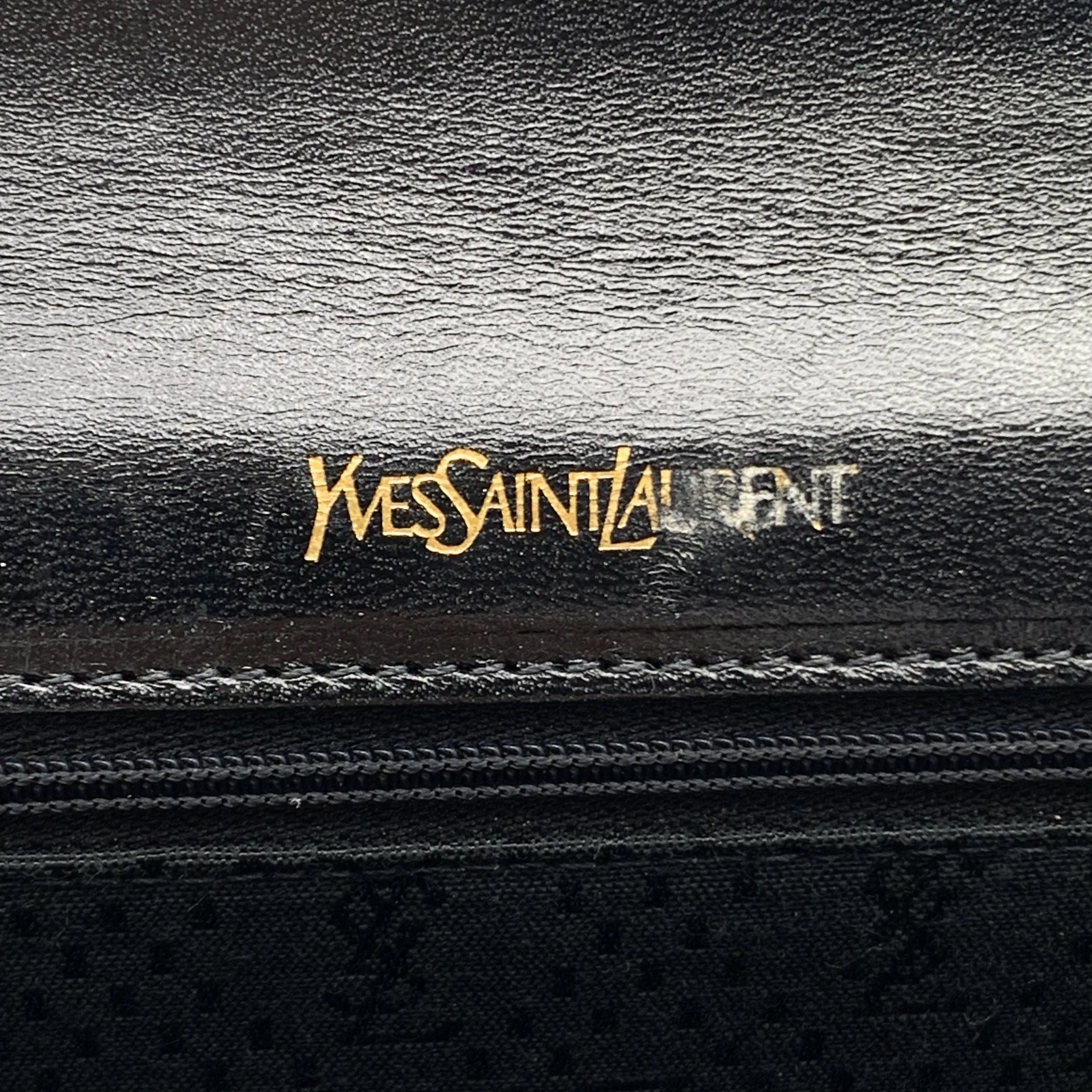 Yves Saint Laurent Vintage Black Embossed Asymmetric Clutch Bag